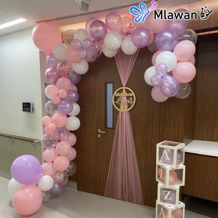 Newborn celebration décor with custom balloon designs at FAKEEH University Hospital