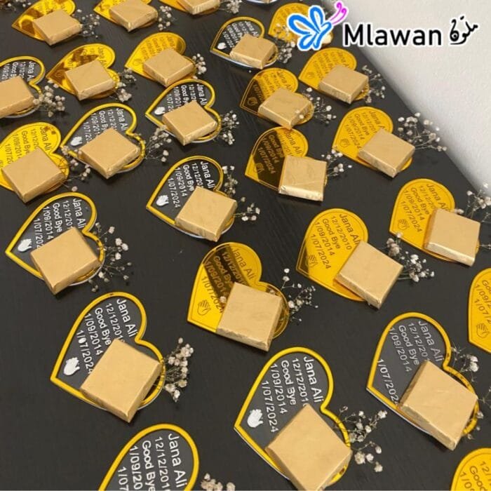 Heart-shaped acrylic giveaways with gold mirror engraving