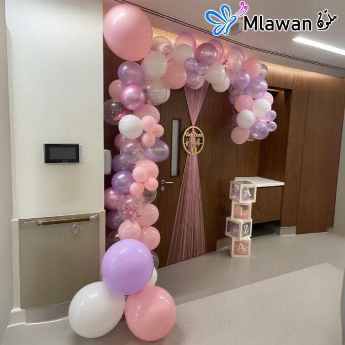 Stylish hospital room decorations with baby name blocks and balloons at Saudi German Hospital