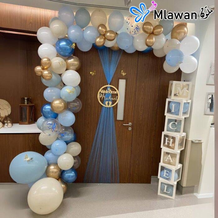 Luxury newborn room decoration with personalized name sign and balloon arch