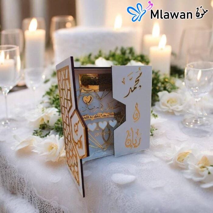 Elegant wooden wedding gift box with engraved names.