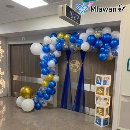 Newborn balloon arch decoration at Danat Al Emarat Hospital with personalized name display