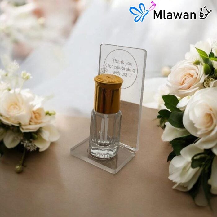 Elegant musk bottle wedding favor with thank-you message