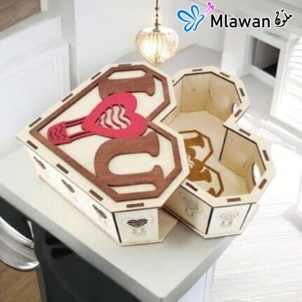 Heart-shaped wooden jewelry box with customizable engraving.