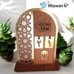 Wooden Eid countdown calendar with Arabic calligraphy.