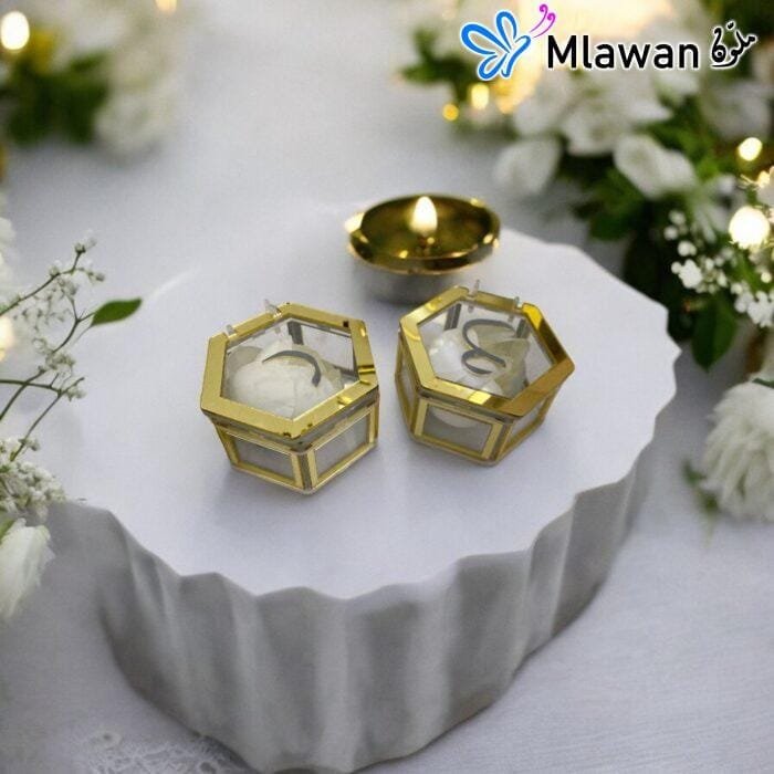 Elegant acrylic hexagon ring box with gold detailing for engagement rings